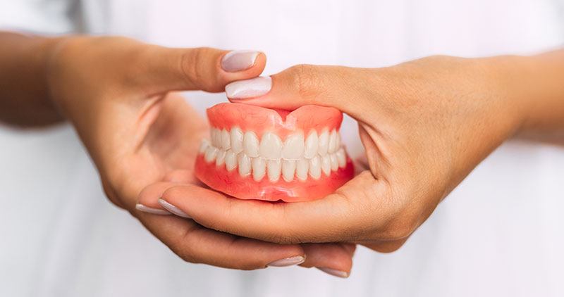 What Are the Pros and Cons of Having Dentures?
